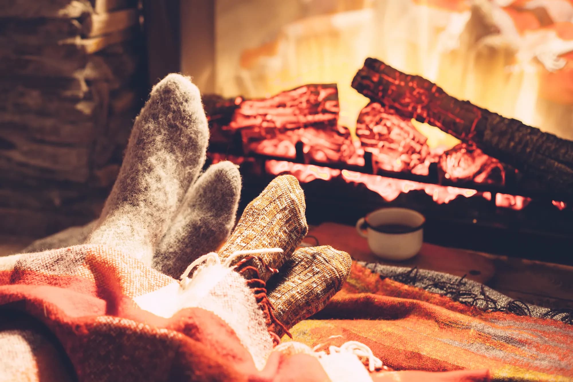 A quiet moment by the fireplace in a cabin at Furutangen